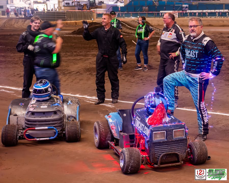 Club racers gathered beside their mowers after racing